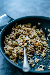 Turkish Stuffed Rice with Currants for Preparing Dolma in Pan with Spoon / Pilav or Pilaf