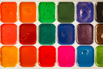 Watercolor color palette, used colors in a box