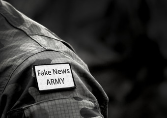 Fake News Army. Inscription Fake News Army on military uniform. Fake News Army Concept. Digital War.