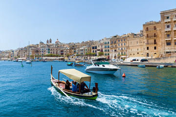 Obraz premium The beautiful harbor with boats in Malta