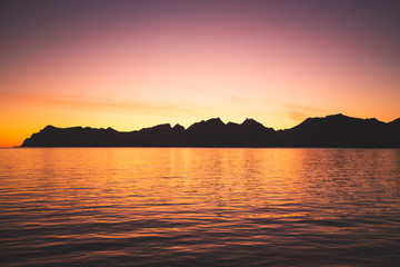 Fototapeta premium Sunset ocean mountain orange 