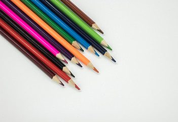 color pencils on a white background