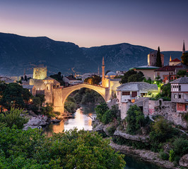 Fototapeta premium Colorful sunset over the medieval bridge of Mostar 
