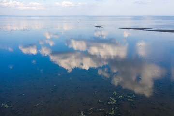 Reflection of clouds in the water surface of the Gulf of Finland