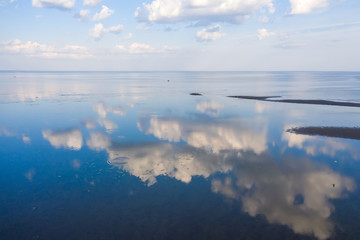 Reflection of clouds in the water surface of the Gulf of Finland