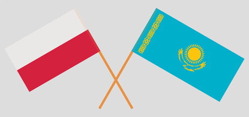 Crossed flags of Kazakhstan and Poland