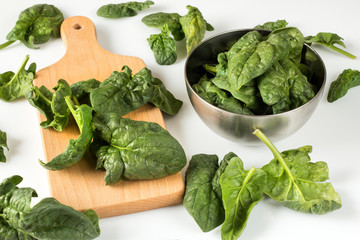 tasty spinach leaves. healthy food concept