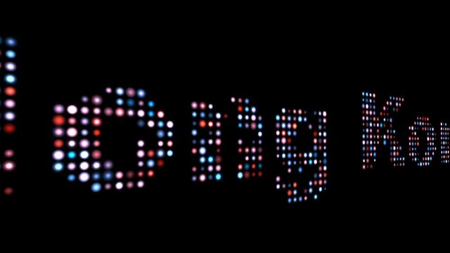 Honk Kong colorful led text over black