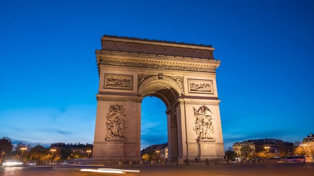 Paris France time lapse 4K, city skyline day to night sunset timelapse at Arc de Triomphe and Champs Elysees