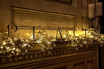 Christmas decoration. Fireplace. Lights. Peace.