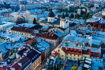 View on a historic center of Lviv at sunset. View on Lvov cityscape from the town hall