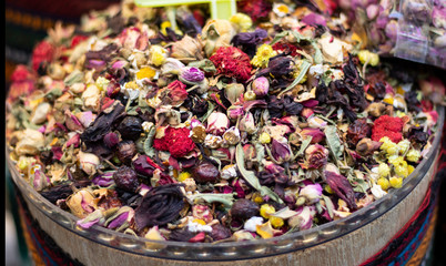 Mixed herbal tea being sold in front of store.