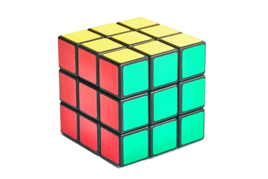 BUDAPEST, HUNGARY - CIRCA 2019: Solved Rubik's cube logic game on white studio background