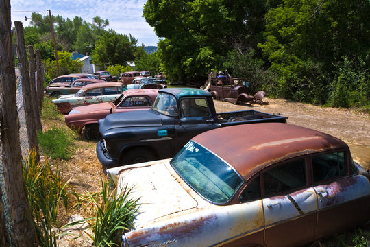 junk yard with old beautiful oldtimers