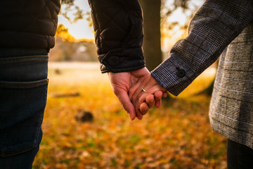 couple walking in autumn park