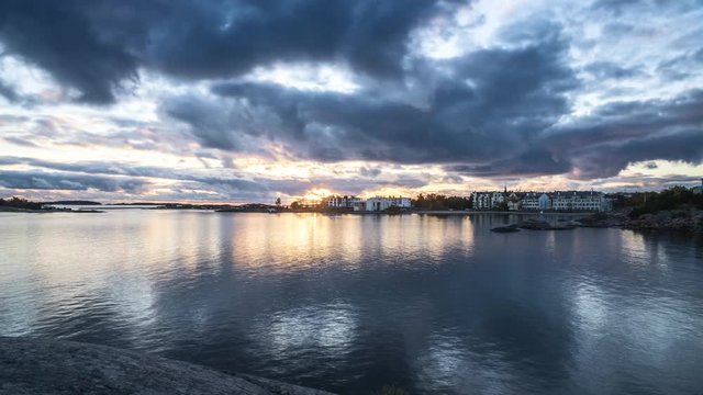 Sunset timelapse of the coastal finnish town Hanko. Amazing cloud formations, sunrays in between.