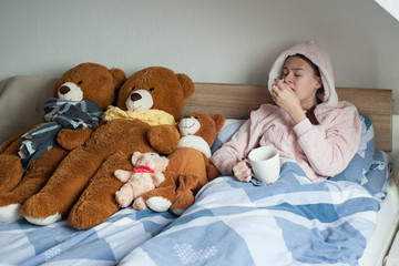 teenager girl with cold symptoms at home