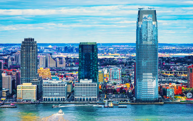 Fototapeta premium Jersey City, New Jersey and Hudson River. View from Manhattan, New York of USA. Skyline and cityscape with skyscrapers at United States of America, NYC, US. Road and American architecture.