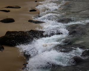 waves crashing on rocks