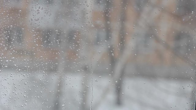 raindrops on the window in winter
