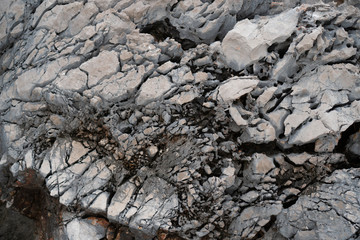 Close-up rock formation with cracks, backgrounds texture