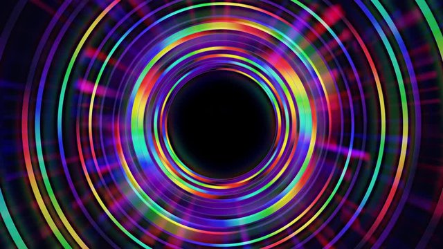 Abstract seamless loop of rainbow colorful rings. Glowing rays emanate from center. 4K 3D motion graphics background for intro, banner, vj, logo