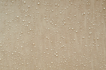 Drops of rain, water on a waterproof fabric close-up. Tent with raindrops - obrazy, fototapety, plakaty