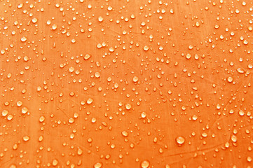 Drops of rain, water on a waterproof fabric close-up. Tent with raindrops