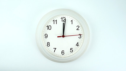White clock beginning of time 12.01 am or pm, on white background, Copy space for your text, Time concept.