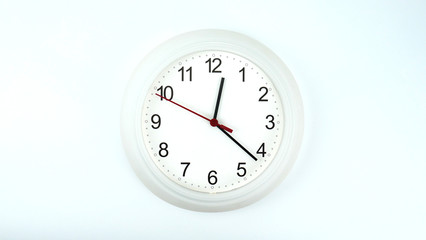 white clock beginning of time 12.22 am or pm, on white background, Copy space for your text, Time concept.