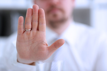 Fototapeta premium Male arm show palm during conference conversation