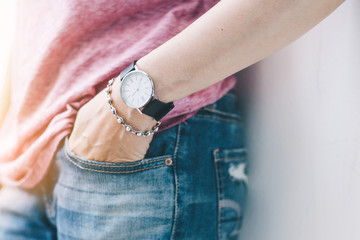 looking at luxury watch on hand check the time at workplace.concept for managing time organization...