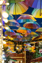 Fototapeta na wymiar Colorful Umbrella Hanging on Ceiling Decoration 