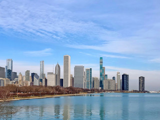 Fototapeta na wymiar Chicago city skyline with Lake Michigan water reflection