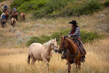 Obraz premium cowgirl on horse