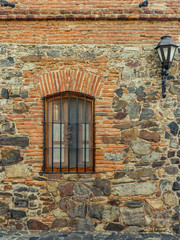 vintage street lamp on the wall uruguay colonia de sacramaneto