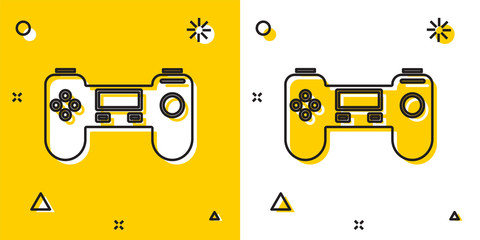 Black Gamepad icon isolated on yellow and white background. Game controller. Random dynamic shapes. Vector Illustration © vector_v