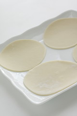 Chinese dumpling, jiozi dough on dish for prepared food image