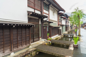 Historical building in village Furukawa in Hida, Gifu prefecture, Japan. Old town with water canal
