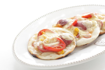 Obraz na płótnie Canvas Fusion food, gyoza dough and tomato cheese bake for pizza style