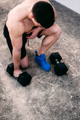 fitness boy resting after exercising