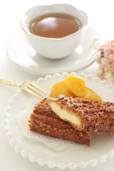 Crispy puff cream in half served with mango