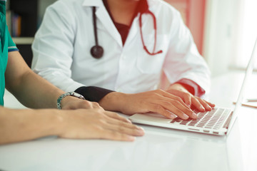 Doctor is talking with patient at hospital