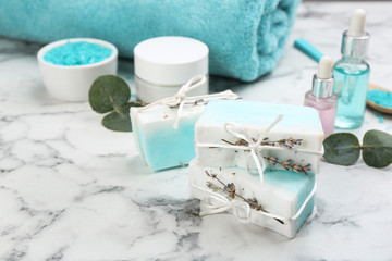 Natural handmade soap bars on marble table