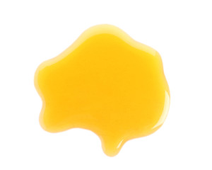 Spilled fresh sweet honey isolated of white