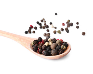 Mix of different pepper grains isolated on white