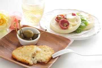 Hashed brown and caper berry pickles for breakfast image