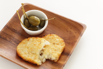Hashed brown and caper berry pickles for breakfast image