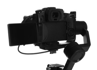 Modern professional video camera isolated on white, closeup