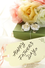 Artificial flower and gift box with ribbon for holiday image